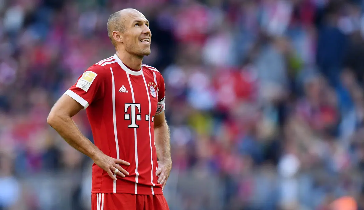4. Arjen Robben - Pria Belanda ini punya catatan baik saat ditangani dua pelatih hebat ini. Pemain berkaki kidal itu mampu meraih gelar untuk Bayer Munchen bersama Pep Guardiola dan Chelsea bersama Jose Mourinho. (AFP/Christof Stache)