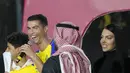 Dalam acara perkenalan tersebut, Ronaldo juga didampingi sang kekasih yakni Georgina Rodriguez dan anak-anaknya. (AP Photo/Amr Nabil)