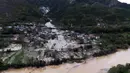 Hujan deras yang membanjiri kota-kota dan memicu tanah longsor menewaskan sedikitnya 14 orang di Bosnia pada hari Jumat (4/10/2024). (ELVIS BARUKCIC/AFP)