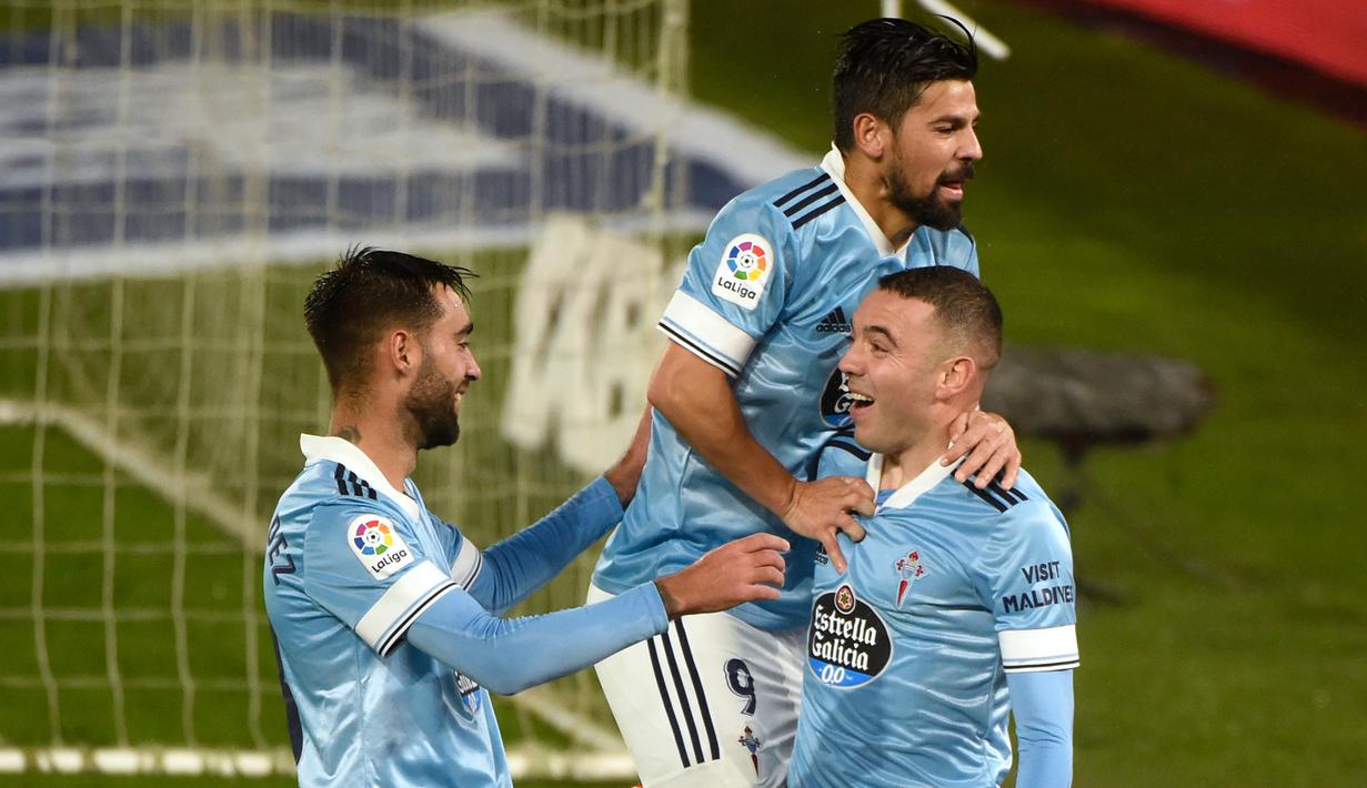 Penyerang Celta Vigo, Iago Aspas, merayakan gol yang dicetaknya ke gawang Cadiz pada laga lanjutan Liga Spanyol di Stadion Abanca Balaidos, Selasa (15/12/2020) dini hari WIB. Celta Vigo menang telak 4-0 atas Cadiz. (AFP/Miguel Riopa)