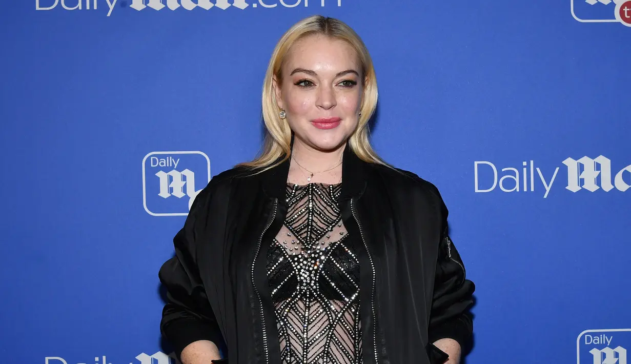 Lindsay Lohan berubah dan mengaku sudah lebih baik. Ia merasa sudah siap untuk kembali ke Hollywood. (SLAVEN VLASIC / GETTY IMAGES NORTH AMERICA / AFP)