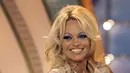 Memasuki usia 48 tahun, Pamela Anderson tetap menjaga tubuhnya tetap seksi. (Bintang/EPA)