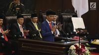 Presiden Joko Widodo atau Jokowi menyampaikan Pidato Kenegaraan pada Sidang Tahunan MPR 2019 di Kompleks Parlemen, Senayan, Jakarta, Jumat (16/8/2019). Jokowi akan menyampaikan pidato dalam tiga sesi dengan tema yang berbeda selama acara berlangsung. (Liputan6.com/Johan Tallo)