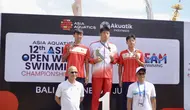 Tianchen Lan asal China, keluar sebagai pemenang nomor 5K putra 12th AOWSC 2026 dengan catatan waktu 00:56:57,0 di Pantai Jimbaran pada Sabtu (13/6/2026). (Alit Binawan/Bola.com)