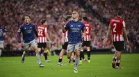 Reaksi Leandro Trossard dari Arsenal setelah mencetak gol kedua bagi timnya dalam pertandingan pembuka Liga Champions antara Athletic Bilbao dan Arsenal di Stadion San Mames, Bilbao, Spanyol, Rabu, 17 September 2025 dini hari WIB. ( AP/Miguel Oses)