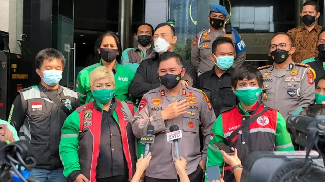 Pengemudi ojek online dari Grab Indonesia mendatangi Polda Metro Jaya.