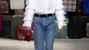 Arsip Moschino tahun 1990an, seperti cetakan bunga, bola kaki, dan pizza yang dibuat di Italia, ditafsirkan dan dikerjakan ulang. [Foto: Document/Moschino]