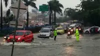 Hujan deras yang mengguyur Kota Pekanbaru, kemarin membuat sejumlah kawasan tergenang air. (Liputan6.com/M Syukur).