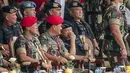 Panglima TNI Marsekal Hadi Tjahjanto berbincang dengan Kapolri Jenderal Tito Karnavian saat menghadiri peringatan ulang tahun ke-67 Komando Pasukan Khusus (Kopassus) di Markas Kopassus, Cijantung, Jakarta, Rabu (24/4). (Liputan6.com/Faizal Fanani)