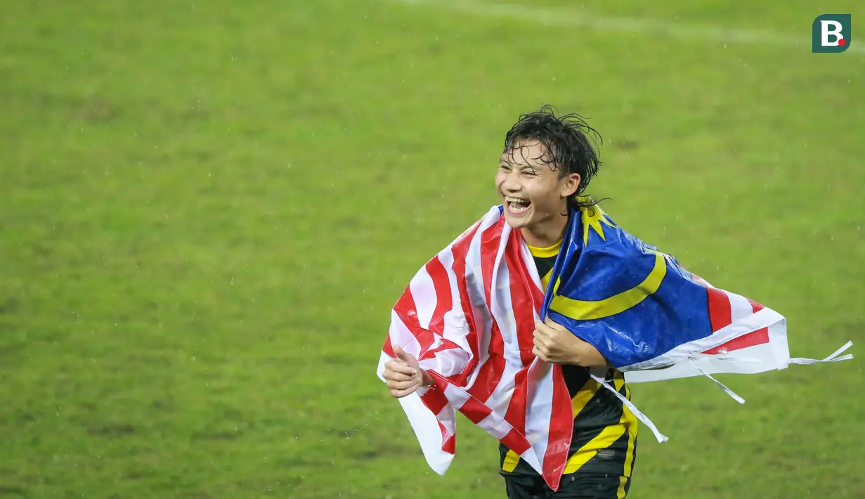 Pemain Timnas Malaysia U-19, Muhammad Haiqal, melakukan selebrasi usai menjuarai Piala AFF U-19 2022 di Stadion Patriot Chandrabhaga, Bekasi, Jumat (15/7/2022). (Bola.com/Bagaskara Lazuardi)
