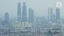 Suasana pemukiman dan gedung pencakar langit diambil dari kawasan Grogol, Jakarta, Rabu (11/11/2020). Gubernur Bank Indonesia, Perry Warjiyo mengaku optimis pertumbuhan ekonomi Indonesia ke depan akan lebih baik pasca pandemi Covid-19. (Liputan6.com/Angga Yuniar)