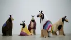 Para penari mengenakan kostum menyerupai kuda berpose saat jumpa pers di Sydney, Australia (8/11). Karya ini adalah kreasi seniman Amerika yang bernama Nick Cave yang akan dibawakan oleh 30 orang penari. (Reuters/Jason Reed)