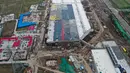 Foto dari udara memperlihatkan pembangunan pabrik Tesla di Shanghai, China pada Selasa (16/7/2019). Pembangunan pabrik produsen mobil listrik yang pertama di luar Amerika Serikat ini memiliki nilai investasi 5 miliar dolar AS atau setara Rp70 triliun. (AFP Photo)