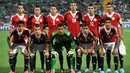 Para pemain starter Mesir berfoto sebelum dimulainya laga menghadapi Inggris dalam laga fase grup Piala Dunia U-20 2013 di Bursa Ataturk Stadium, Turki (29/6/2013). Kesuksesan Mesir di ajang Piala Dunia U-20 ditandai dengan keberhasilan mereka menempati peringkat ketiga pada edisi 2001 di Argentina setelah mengalahkan Paraguay 1-0 dalam laga perebutan tempat ketiga. (AFP/Fabian Gredillas)