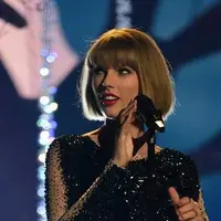 Intip gaya Taylor Swift mulai dari berpenampilan manis hingga terlihat lebih sensual. (AFP/Robyn Beck)