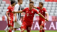 Joshua Kimmich adalah pemain serba bisa milik Bayern Munchen. Orang yang paling berjasa dalam kariernya adalah Ralf Rangnick. Bakat Kimich baru muncul saat direkrut menuju RB Liepzig atas saran Rangnick yang saat itu menjabat sebagai Direktur Olahraga di sana. (AFP/Pool/Sven Hoppe)