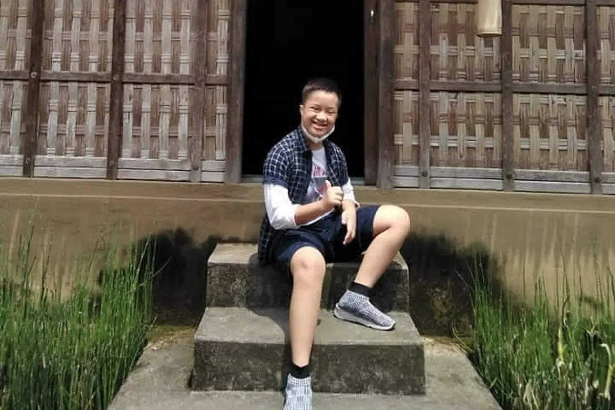 Wahyu Nizam Arden Abhista penyandang Down syndrome asal Malang. Foto: Dok. Pribadi.