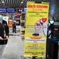 Petugas kesehatan Malaysia dikerahkan untuk kesiagaan terhadap penyebaran coronavirus di Bandara Internasional Kuala Lumpur pada Selasa (21/1/2020). Malaysia meningkatkan kesiagaan terhadap penyebaran virus corona misterius mirip pneumonia di semua titik masuk internasional. (MOHD RASFAN/AFP)