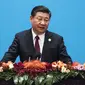 Xi Jinping adalah Presiden China, namanya ditulis dalam konstitusi Partai Komunis sehingga menguatkannya sebagai pemimpin negara paling berkuasa dalam beberapa dekade terakhir. (AFP Photo/Pool/Fred Dufour)