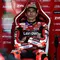 Pembalap MotoGP Spanyol dari Tim Ducati Lenovo, Marc Marquez, memperhatikan monitor saat duduk di pit-nya selama sesi latihan Grand Prix Moto GP Italia di sirkuit Mugello, di Mugello, dekat Florence, pada 29 Mei 2026. (Andreas SOLARO/AFP)