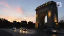 Pemandangan monumen Arcul De Triumf atau The Arch of Triumph di Jalan Kiseleff, Bucharest, Rumania, Sabtu (30/9/2023). Monumen ini memperingati kemenangan Rumania dalam Perang Dunia Pertama dan penobatan Raja Ferdinand dan istrinya Marie. (Liputan6.com/Herman Zakharia)