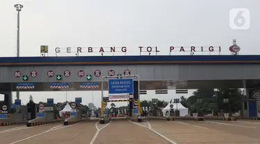 Suasana jalan Tol Kunciran-Serpong di Gerbang Tol Parigi, Tangerang Selatan, Jumat (6/12/2019). Ruas tol sepanjang 11,1 km tersebut diharapkan bisa memudahkan perjalanan masyarakat yang berasal dari arah Serpong menuju Bandara Soekarno Hatta, Cengkareng. (Liputan6.com/Angga Yuniar)