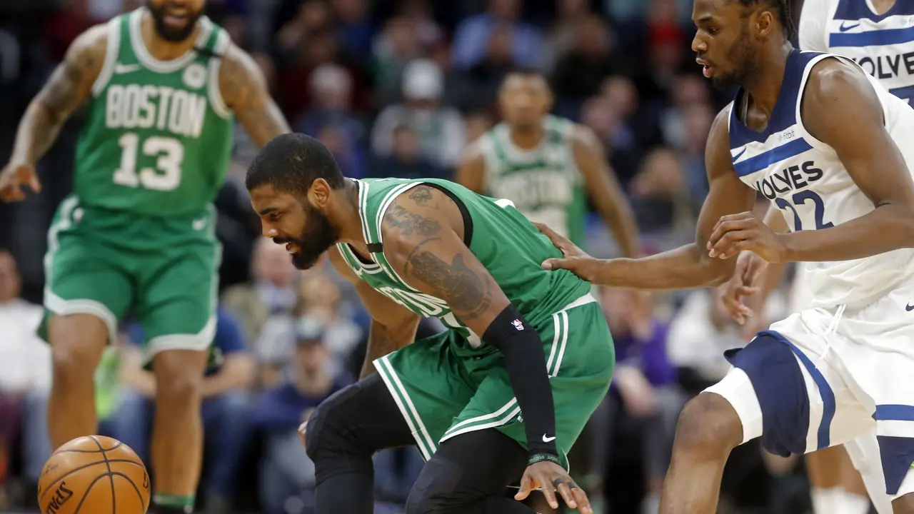 Aksi Kyrie Irving saat Celtics mengalahkan Timberwolves