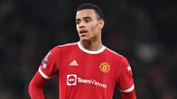 Pemain MU, Mason Greenwood menjadi pesepak bola teranyar yang sempat dipenjara akibat tindak kriminal. Sebelumnya, telah banyak kasus yang mengharuskan pesepak bola mendekam dalam jeruji besi untuk mempertanggung jawabkan perbuatan kriminalnya. siapa saja? (AFP/Paul Ellis)