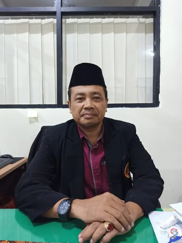 Amir Hasan, guru SMK 57