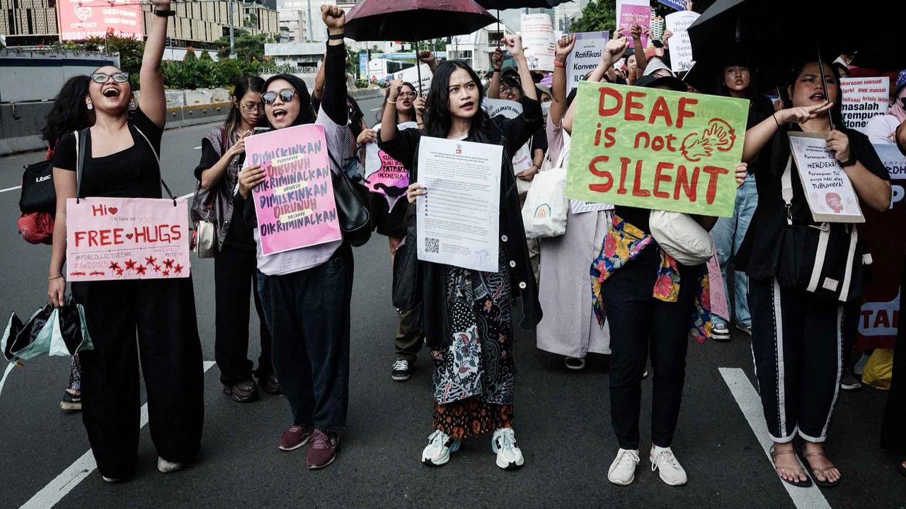 FOTO:  Peringati Hari Perempuan Sedunia, Aktivis Perempuan Mengampanyekan Stop Kekerasan Terhadap Perempuan