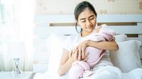 Ilustrasi ibu dan bayi. (Image by jcomp on Freepik)