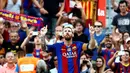 Ekspresi pemain Barcelona, Lionel Messi, setelah mencetak gol ke gawang Real Betis dalam laga La Liga di Stadion Camp Nou, Minggu (21/8/2016) dini hari WIB. (AFP/Pau Barrena)