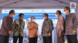 BP Tapera, Bank BTN, dan Perum Perumnas menandatangani Nota Kesepahaman tentang Proyek Inisiasi Penyaluran Pembiayaan Tabungan Perumahan Rakyat dengan berbagai manfaat dan kemudahan dari fasilitas Kredit Pemilikan Rumah (KPR) Tapera di Jakarta, Kamis (20/5/2021). (Liputan6.com/HO/BTN)