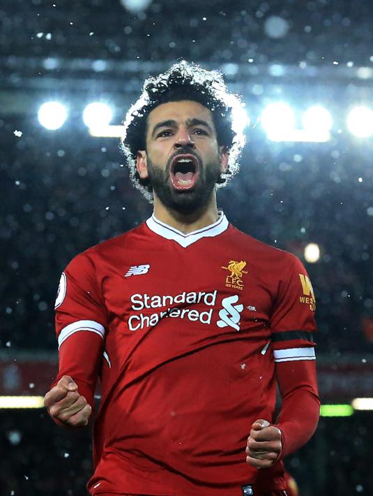 9. Mohamed Salah - Dibuang Chelsea dan tampil biasa bersama AS Roma, Salah digaet dengan penuh keraguan. Namun dibawah asuhan Klopp, Mo Salah tampil luar biasa dan bisa menjadi transfer terbaik The Reds sepanjang masa. (AFP/Lindsey Parnaby)