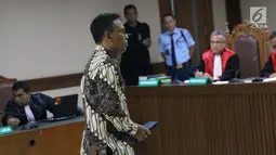 Terdakwa korupsi pembangunan gedung IPDN Budi Rachmat Kuniawan saat sidang putusan di Pengadilan Tipikor, Jakarta, Jumat (26/7/2019). Budi terbukti bersalah melakukan korupsi proyek pembangunan kampus IPDN di Kabupaten Agam, dan Kabupaten Rokan Hilir, Riau. (Liputan6.com/Helmi Fithriansyah)