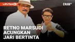 Menteri Luar Negeri Retno Marsudi menyalurkan hak suaranya bersama sang suami di Kota Depok Jawa Barat. Ia sempat mengantri bersama puluhan warga setempat.