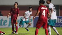 Pemain Timnas Indonesia U-16, Muhammad Kafiatur Rizky (tengah) melakukan selebrasi usai mencetak gol ke gawang Vietnam U-16 dalam laga final Piala AFF U-16 2022 antara Vietnam U-16 melawan Indonesia U-16 di Stadion Maguwoharjo, Sleman, Jumat (12/8/2022) malam WIB. (Bola.com/Bagaskara Lazuardi)