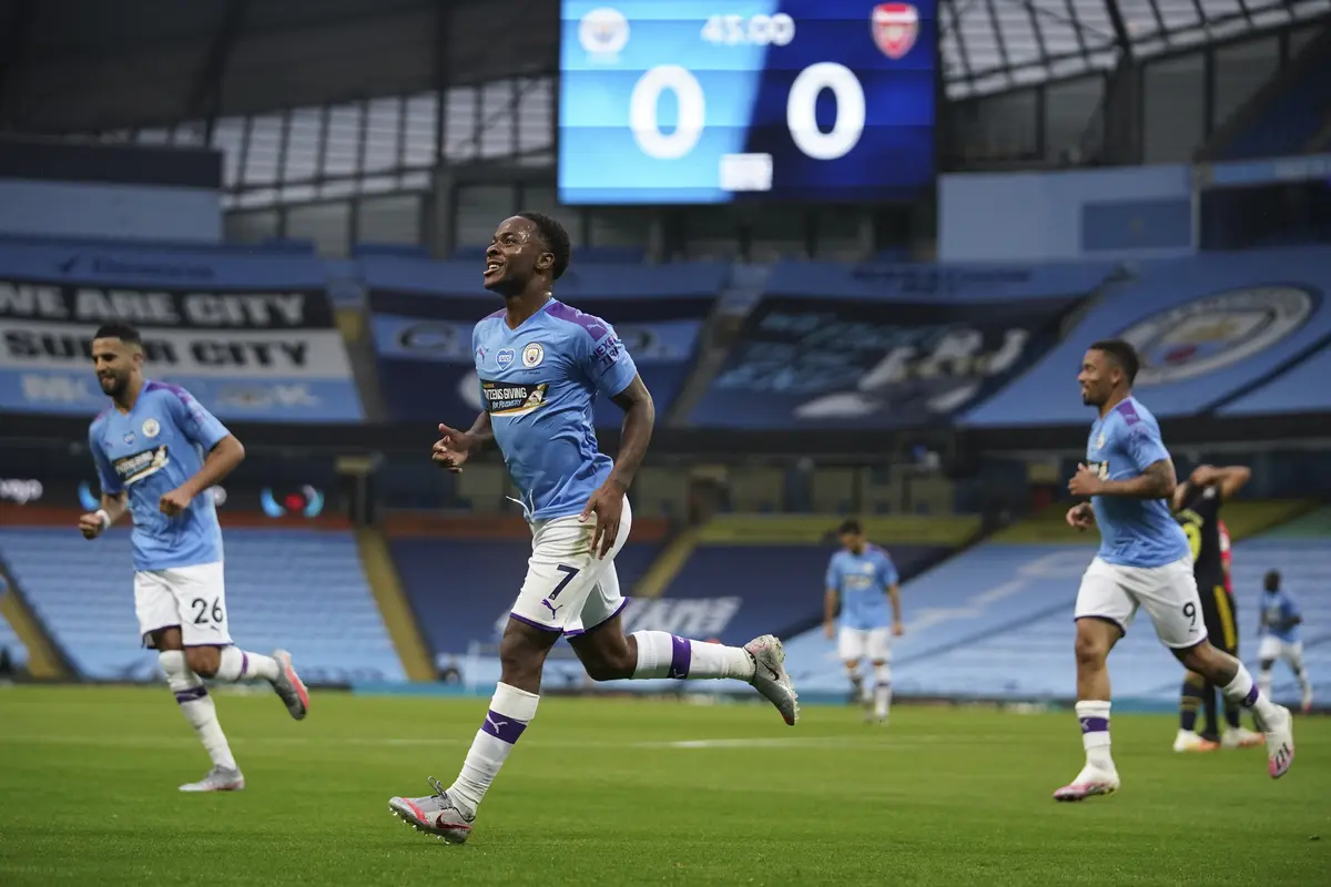 Winger Manchester City, Raheem Sterling merayakan golnya ke gawang Arsenal