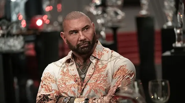 The best Dave Bautista movies you need to watch. (Photo: Dave Bautista in Glass Onion (2022) - John Wilson © 2022 Netflix)