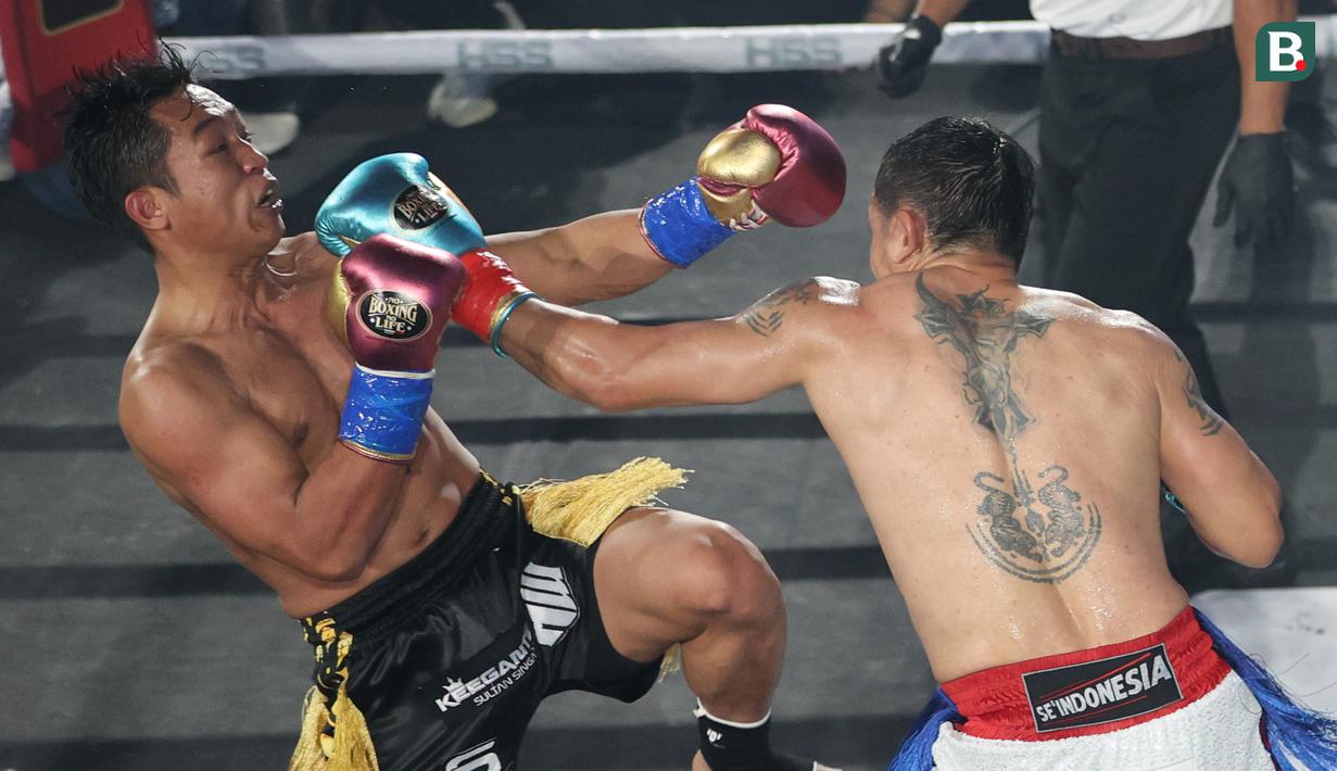 Jika pada pertemuan pertama di HSS Series 6 Rudy menang lewat tinju, maka kali ini duel berlangsung dalam aturan kickboxing. (Bola.com/M Iqbal Ichsan)