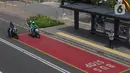 Pengendara sepeda motor melintas di jalanan Ibu Kota Jakarta, Selasa (24/12/2019). Libur Natal dan Tahun Baru membuat kondisi lalu lintas di Jakarta lengang. (Liputan6.com/Angga Yuniar)
