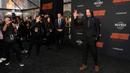 Keanu Reeves menjadi sosok yang necis saat melewati karpet merah pemutaran perdana film terbarunya, John Wick: Chapter 4. (AP Photo/Chris Pizzello)