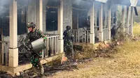 Kelompok bersenjata di Ilaga Puncak Provinsi Papua Tengah diduga membakar 10 rumah tenaga kesehatan. (Liputan6.com/Katharina Janur/Penkogabwilhan III)