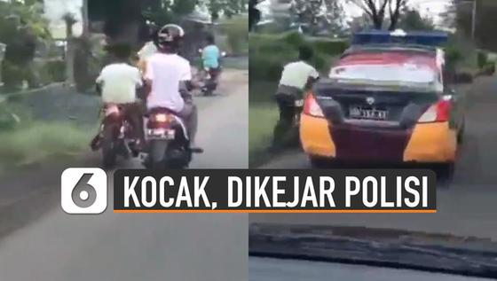VIDEO: Kocak, Aksi Kabur Pemotor yang Panik Saat Dikejar Mobil Polisi