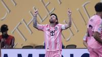 Pemain Inter Miami Lionel Messi melakukan selebrasi&nbsp;usai mencetak gol dalam laga Grup A Piala Dunia Antarklub melawan Porto di Atlanta, Jumat,&nbsp;20 Juni 2025. (AP Photo/Mike Stewart)