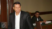 Mantan Direktur Utama PT Pelindo II, Richard Joost Lino bersiap meninggalkan tempat usai menjalani sidang lanjutan di Pengadilan Tipikor Jakarta, Rabu (22/3). Kasus tersebut merugikan keuangan negara sebesar Rp36,97 miliar. (Liputan6.com/Helmi Afandi)
