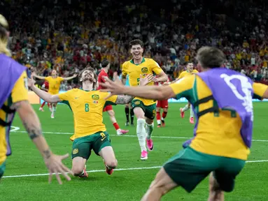 Pemain Australia merayakan kemenangan atas Turki pada laga matchday 1 Grup D Piala Dunia 2026 di BC Place, Vancouver, Kanada, Minggu (14/6/2026) siang WIB. (AP Photo/Abbie Parr)