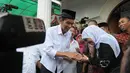Jokowi dan Khofifah Indar Parawansa (Liputan6.com/Herman Zakharia)