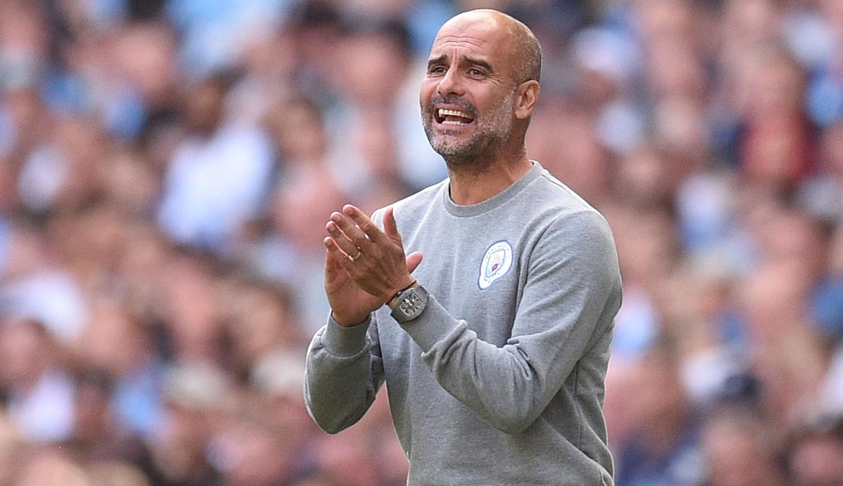 Manajer terbaik Liga Inggris hingga paruh musim 2021/22 bisa dibilang milik Pep Guardiola. Pasalnya, ia mampu mempersembahkan tiga kali gelar juara Liga Inggris dalam kurun empat tahun. The Cityzens juga tengah mengincar gelar keempatnya bersama Pep pada musim ini. (AFP/Oli Scarff)