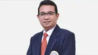 Pakar Ekonomi Universitas Airlangga (Unair) Surabaya, Wisnu Wibowo, menanggapi imbas penyebaran virus Corona di Cina terhadap perekonomian di Indonesia. (Liputan6.com/ Dian Kurniawan)